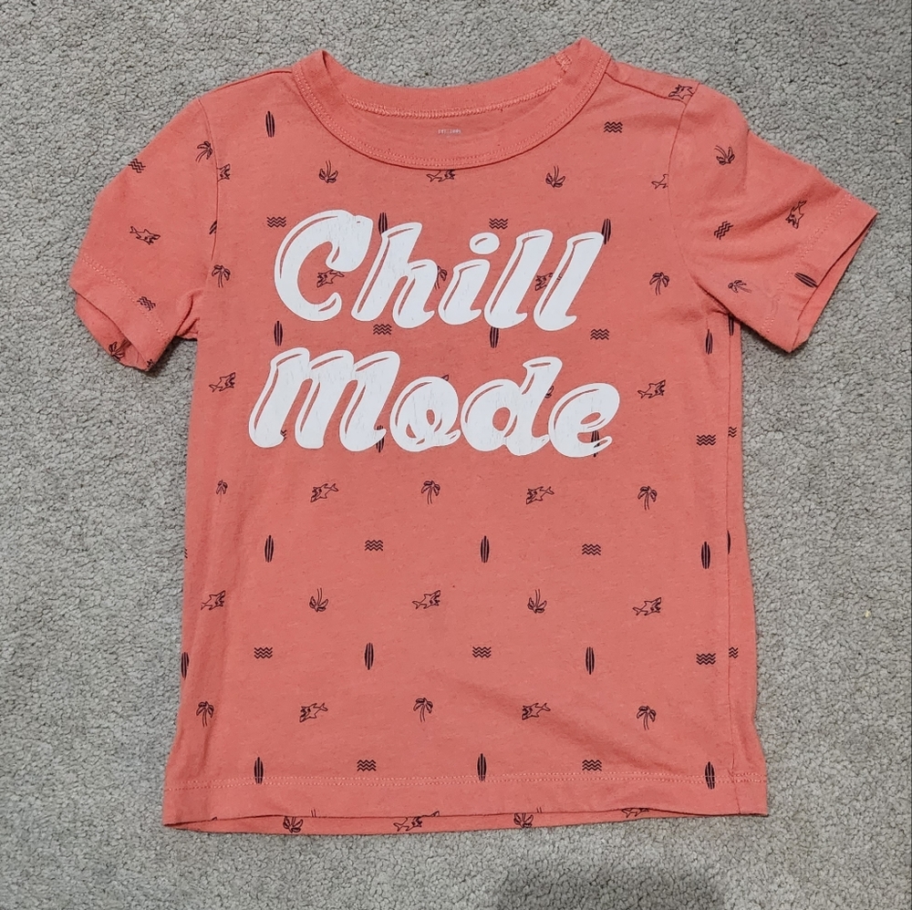 Peach colored boys short sleeve shirt